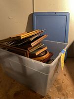Plastic tote with lid and stacked frames