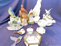 Group shot of all bird-themed items in lot