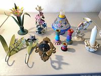 full lot showing all hooks, candleholders, figurine