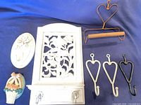 group view of all seven wall hook items