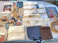 Overall view of all embroidery supplies on table