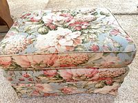 Top view showing floral upholstery and piping