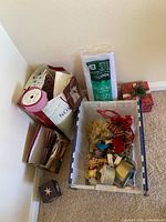 Corner setup showing storage tote, gift bags, tissue pack, gift boxes