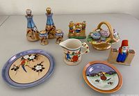 Group shot of entire ceramic lot showing all nine pieces