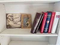 Shelf with nine vintage Norwegian books