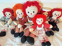 Group shot of all six Raggedy Ann & Andy dolls