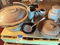 Group shot showing all cookware and pitchers on tabletop