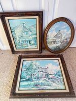 All three framed Marty Bell prints on floor