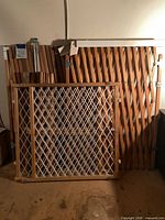 Overall lot view showing accordion panels and lattice gate