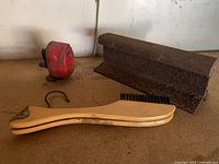 Group shot of rail anvil, Pixie sharpener, folding hanger brush