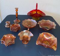 Group shot of all amberina carnival glass pieces