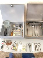 Overall lot with cash boxes open showing contents and loose accessories