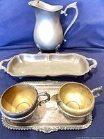 Group shot: pitcher, divided tray, small tray with creamer and sugar bowl