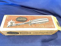 Full view of retail box showing product illustration and branding