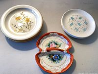 Stack of Mikasa plates, stack of Vernonware plates, Coronation relish dish