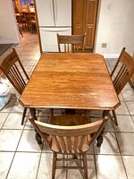 Dining table with four chairs, full set view