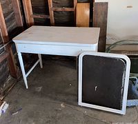 Desk and chalkboard frame together