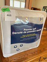 Front of sealed package showing brand, series, warranty