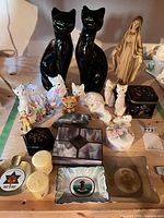 Group shot showing all figurines, boxes and dishes