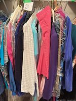 Rack of assorted women’s garments on hangers