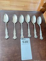 Full set of six sterling silver ornate teaspoons