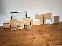 All frames lined up showing backing materials and size range