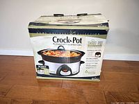 Full view of boxed Crock-Pot Smart-Pot slow cooker