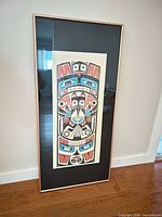 Full view of framed print showing artwork and frame