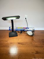 Overall lot: desk lamp, packaged GE BrightStik, swan lamp