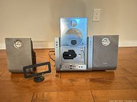 Front view of complete Philips MCM240/37 stereo system with speakers, antenna stand and cables