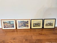 Front view of all four framed artworks lined up