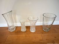 All four vases side by side for scale and comparison