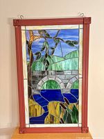 Full view of stained glass panel in frame