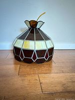 Front angled view showing full shade shape, colors, lead came