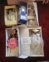 Overview of six boxed dolls