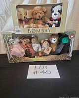 Both boxed sets displayed together