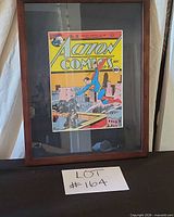 Full view of framed Action Comics print showing frame, artwork and size reference
