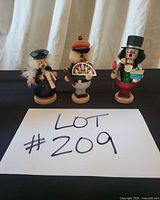 All three STRACO Räuchermännchen figurines front view