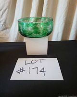 Front view showing emerald cut-to-clear bowl on stand