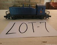 Left side profile of blue Lionel 621 switcher showing overall condition and cab markings