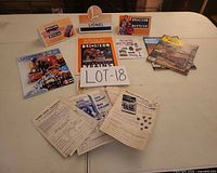 All items arranged showing display signs, brochures, magazines, instruction sheets