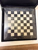 Marble chess board inside open storage box