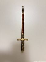 Full view of letter opener with sheath