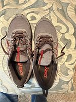 Top view of both shoes showing uppers, laces, insoles