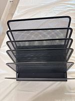 Front view showing five slots