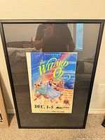 Entire framed poster showing frame, mat and full poster