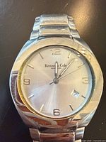 Front view of Kenneth Cole wristwatch showing dial details