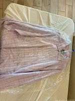Lavender check Joseph Abboud shirt in plastic on table