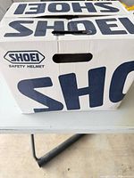 Shoei branded box side panel