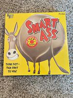Front of Smart Ass board game box